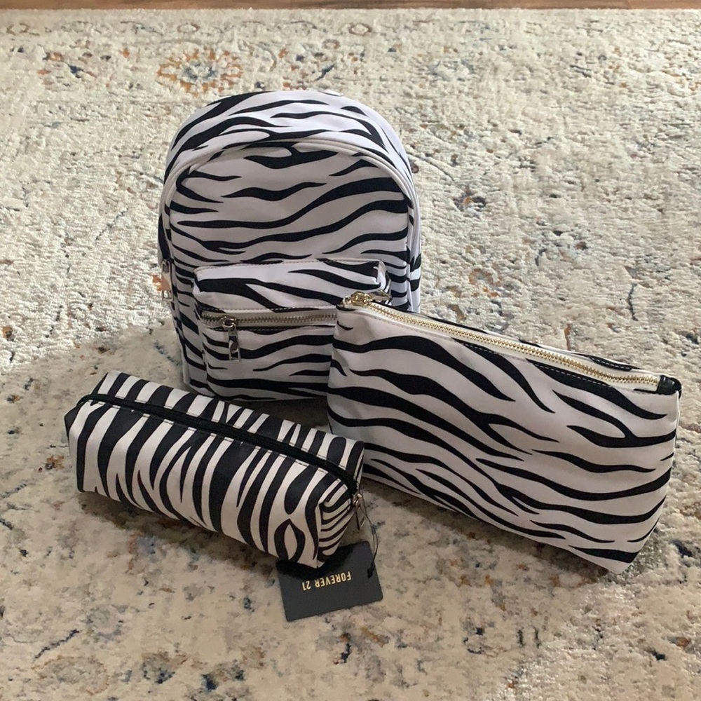 Zebra backpack and cosmetic bag
